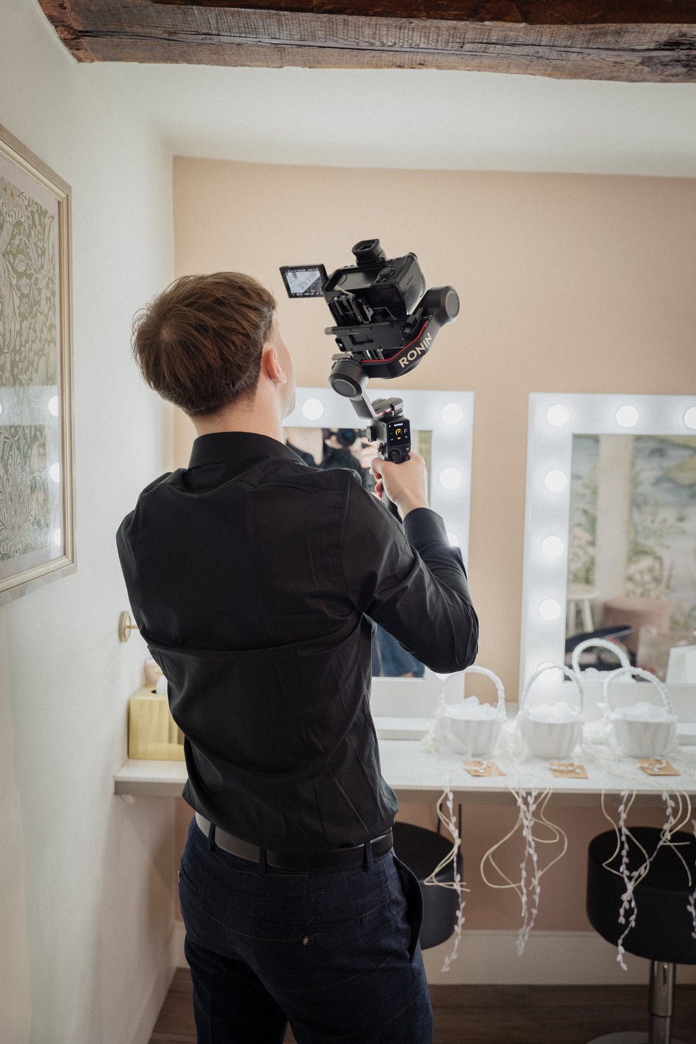 Lucas Dixon filming on a wedding morning